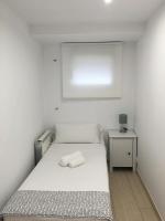Posteľ alebo postele v izbe v ubytovaní Aiguaneu S´Ermita