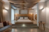 Postel nebo postele na pokoji v ubytování Harbour Suites Fethiye