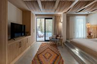 Postel nebo postele na pokoji v ubytování Harbour Suites Fethiye