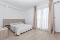 Posteľ alebo postele v izbe v ubytovaní Hotel Olympia Ronda II