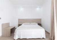 Posteľ alebo postele v izbe v ubytovaní Hotel Olympia Ronda II