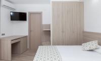 Posteľ alebo postele v izbe v ubytovaní Hotel Olympia Ronda II