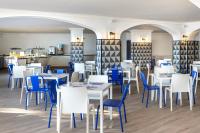 Reštaurácia alebo iné gastronomické zariadenie v ubytovaní Hotel Vibra Marítimo