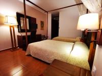 Posteľ alebo postele v izbe v ubytovaní Hotel Electra