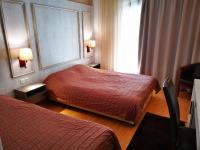 Posteľ alebo postele v izbe v ubytovaní Hotel Electra