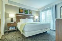 Ein Bett oder Betten in einem Zimmer der Unterkunft Desert Rose Resort