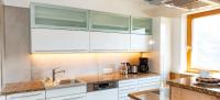 A kitchen or kitchenette at ArtiHome