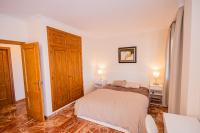 Postel nebo postele na pokoji v ubytování Cubo's Villa Yedra Guadalmar