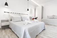 Posteľ alebo postele v izbe v ubytovaní Skalidis Apartments Stalis