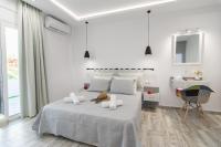 Posteľ alebo postele v izbe v ubytovaní Skalidis Apartments Stalis