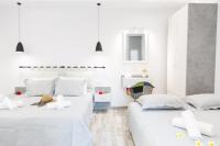 Posteľ alebo postele v izbe v ubytovaní Skalidis Apartments Stalis