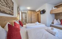 Łóżko lub łóżka w pokoju w obiekcie Holiday Lodge Fürst