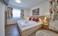 Łóżko lub łóżka w pokoju w obiekcie Holiday Lodge Fürst