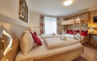 Łóżko lub łóżka w pokoju w obiekcie Holiday Lodge Fürst
