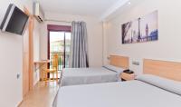 Posteľ alebo postele v izbe v ubytovaní Hotel Olympia Ronda I