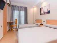 Posteľ alebo postele v izbe v ubytovaní Hotel Olympia Ronda I