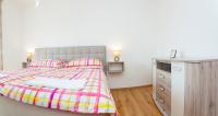 Łóżko lub łóżka w pokoju w obiekcie Holiday apartment IVICA