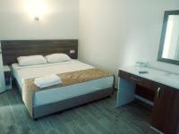 Postel nebo postele na pokoji v ubytování Valeri Beach Hotel