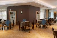 een eetkamer met tafels en stoelen bij Hotel Nobel Ultra All Inclusive - FREE Beach Access in Sunny Beach