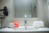 A bathroom at Unique apartment in Glyfada center
