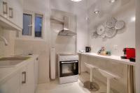 A kitchen or kitchenette at Unique apartment in Glyfada center