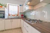 Kuchyňa alebo kuchynka v ubytovaní Apartments Coronata