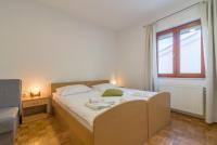 Posteľ alebo postele v izbe v ubytovaní Apartments Coronata