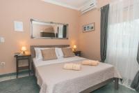Posteľ alebo postele v izbe v ubytovaní Apartments Villa Chiara Opatija