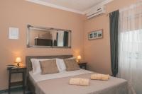 Posteľ alebo postele v izbe v ubytovaní Apartments Villa Chiara Opatija