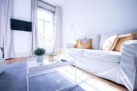 TV a/nebo společenská místnost v ubytování Calacatta Housing