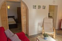 A bed or beds in a room at Haus Taekema Appartments