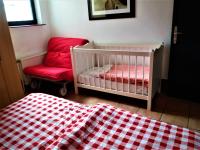 A bed or beds in a room at Haus Taekema Appartments