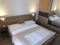 Posteľ alebo postele v izbe v ubytovaní Apartments Sea Vodice