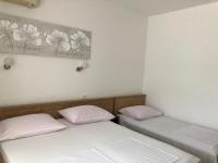 Posteľ alebo postele v izbe v ubytovaní Apartments Sea Vodice