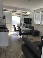 TV a/nebo společenská místnost v ubytování Apartment Santa Marina