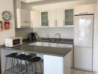 A kitchen or kitchenette at Harbour Lights