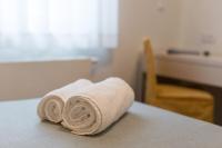 Posteľ alebo postele v izbe v ubytovaní Residence Veglia