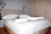Posteľ alebo postele v izbe v ubytovaní Cosy Apartments Daphne