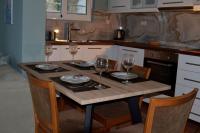 Kuchyňa alebo kuchynka v ubytovaní Cosy Apartments Daphne