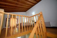 A bed or beds in a room at Olive Press Hotel & Apartments