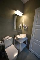 A bathroom at Olive Press Hotel & Apartments