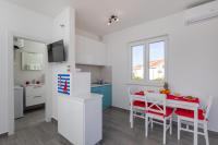 Kuchyň nebo kuchyňský kout v ubytování Brand New Apartment Nebo