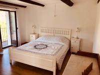 Postel nebo postele na pokoji v ubytování Casa Ruscada