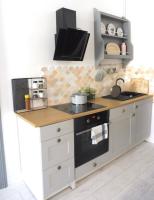 Kuchnia lub aneks kuchenny w obiekcie Apartament Pod Tężnią