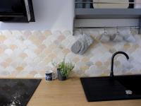 Kuchnia lub aneks kuchenny w obiekcie Apartament Pod Tężnią