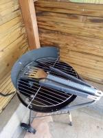 a grill with a knife on top of it at les vignes d&#39;Ygrande in Ygrande