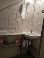 a bathroom with a sink and a mirror at les vignes d&#39;Ygrande in Ygrande