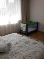 Posteľ alebo postele v izbe v ubytovaní Apartament – 3 pokojowe dwupoziomowe mieszkanie z ogrodem