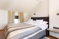 Postel nebo postele na pokoji v ubytování Pampas apartments Mrežnica