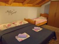 Postel nebo postele na pokoji v ubytování Apartments Vidic